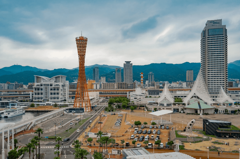 Blogs 18 Kobe Tourist Attractions, City skyline with tower and mountains